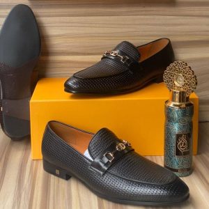 Black perforated leather loafers